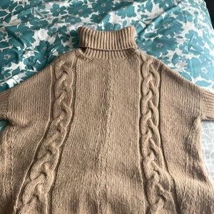 Slouchy wool sweater .